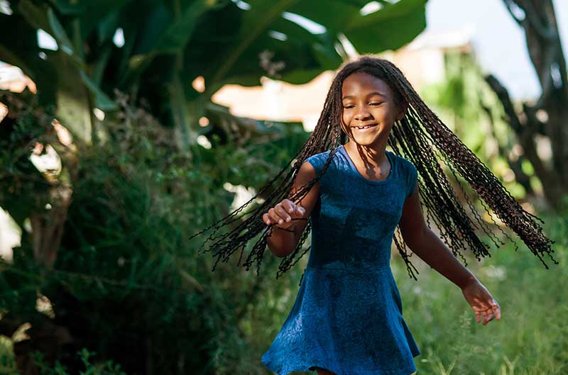 African girl playing | Creative System