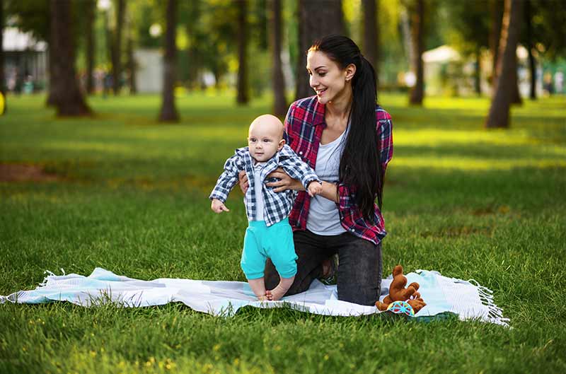 mother playing with kid