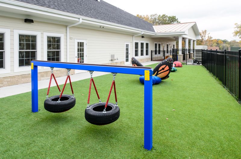 playground with school building