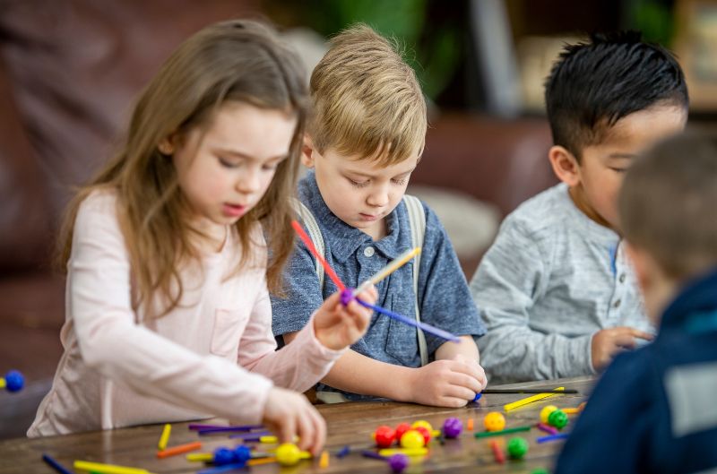 Kids playing with loose parts